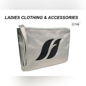 Farmasi Metallic Silver Wristlet. Lined. New Without Tags.